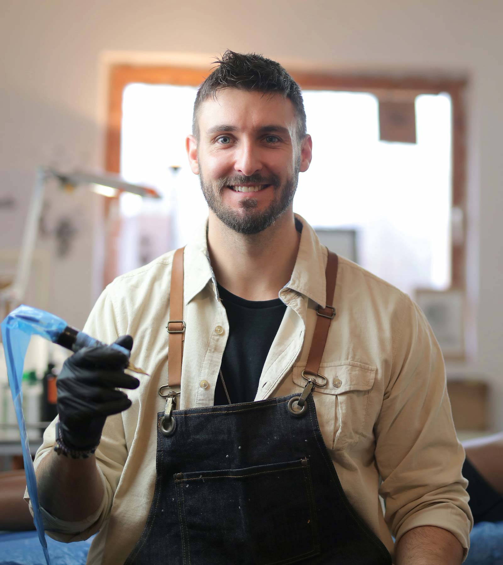 Man Holding Soldering Iron Man holding Soldering Iron